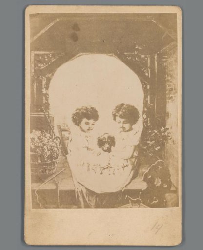 Human skull, or, two unknown children with a dog