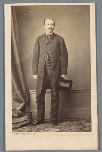 Portrait of an unknown man with a hat in his hand