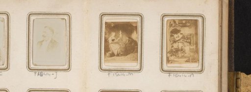 Photographic reproduction of two unknown women by a spinning wheel