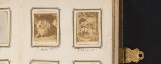 Photographic reproduction of a group of unknown people in front of a house, with several dogs in the foreground