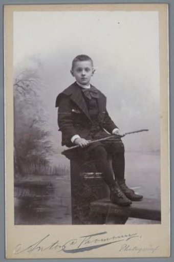 Studio Portrait of an Unknown Boy with a Fishing Rod