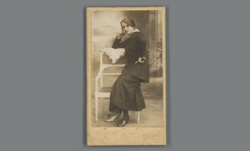 Miniature portrait of an unknown young woman, sitting on the back of a chair