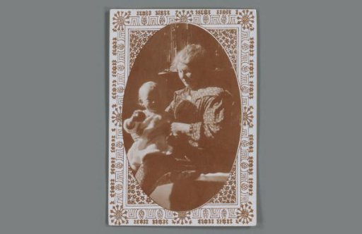 Portrait of an unknown woman with a toddler, framed by a decorative border