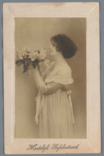 Portrait of an unknown woman holding a bouquet of flowers
