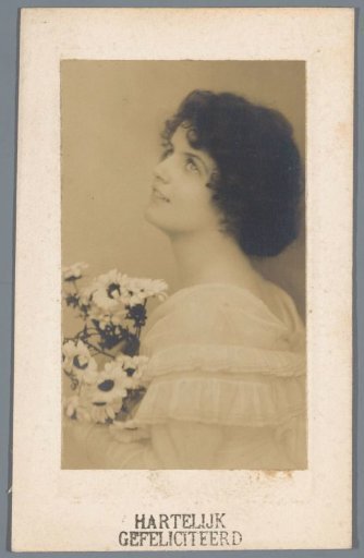Portrait of an unknown woman holding a bouquet of flowers