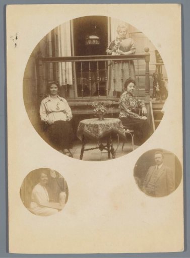 Group portrait of an unknown group on a veranda