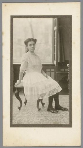 Portrait of an unknown girl in a lace dress