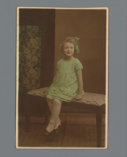 Portrait of an unknown girl in a green dress