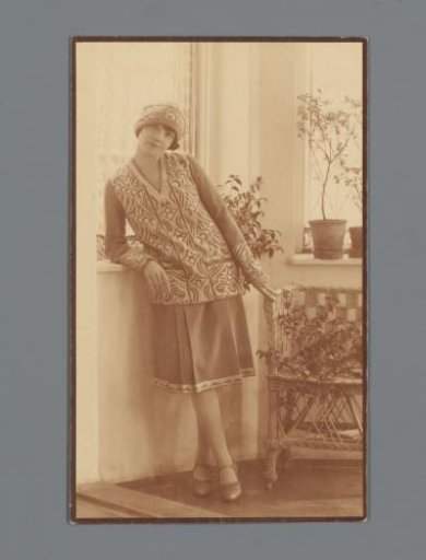 Mannequin with embroidered clothing and cap from the Wiener Werkstätte