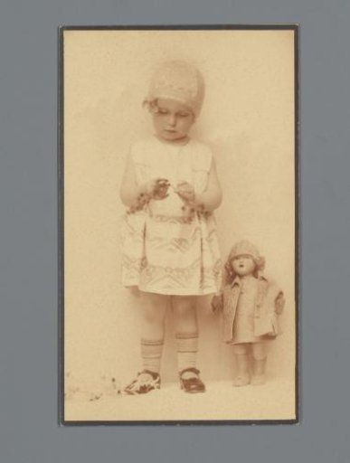 Mannequin with embroidered dress and cap from the Wiener Werkstätte