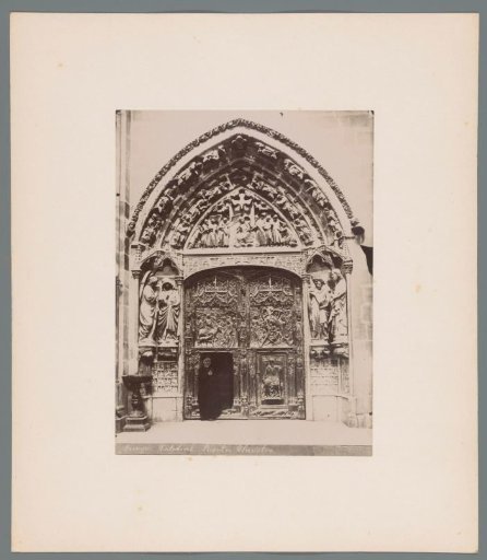 Puerta del claustro alto in the Cathedral of Burgos, with an unknown priest in the doorway