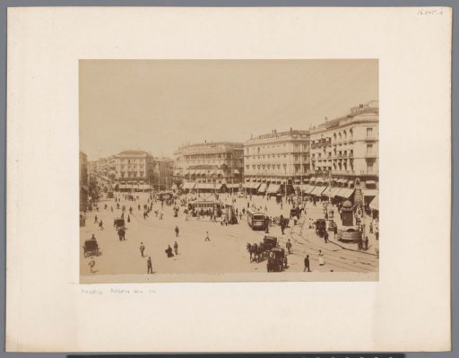 View of the Puerta del Sol in Madrid, with the photography studio of Amador Cuesta on the upper floor of the building depicted on the right