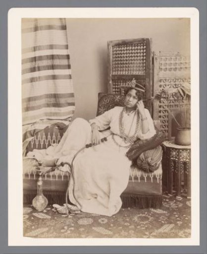 Portrait of an unknown Turkish woman with waterpipe