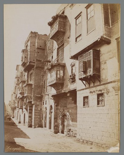 View of facades with mashrabiya windows in the Arab Quarter in Cairo