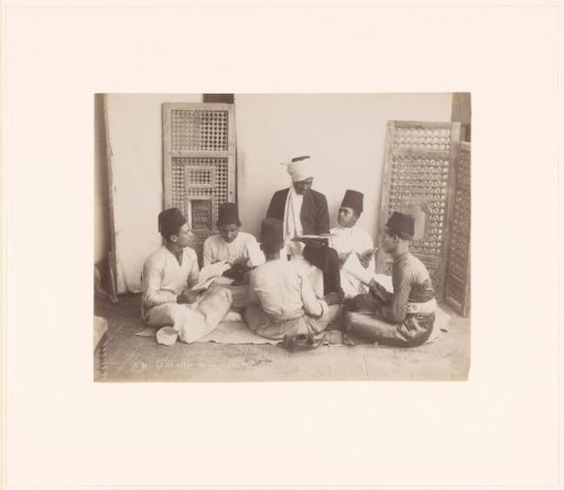 Schoolroom with pupils and schoolmaster.