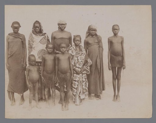 Group portrait of nine unknown women and children from French Equatorial Africa.