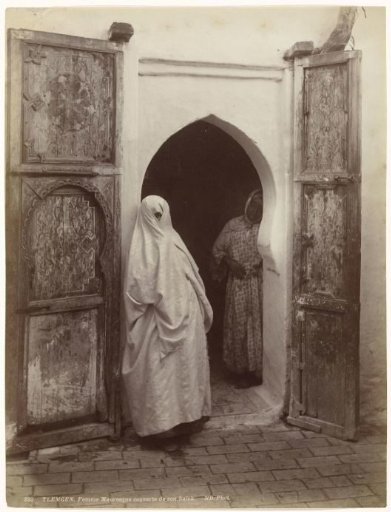 Two women in a doorway in Tlemcen, Algeria.