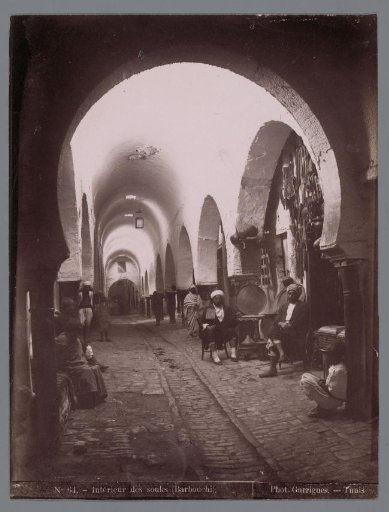 View in the Souk el-Trouk in the Medina of Tunis, on the right the shop of the Barbouchi Brothers.