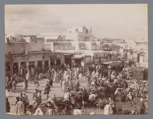 Vegetable merchants on a square, presumably in Tunis.