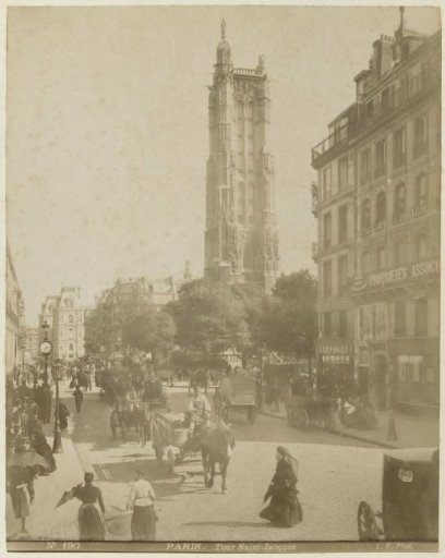 Street view in Paris with the Tour Saint-Jacques in the background