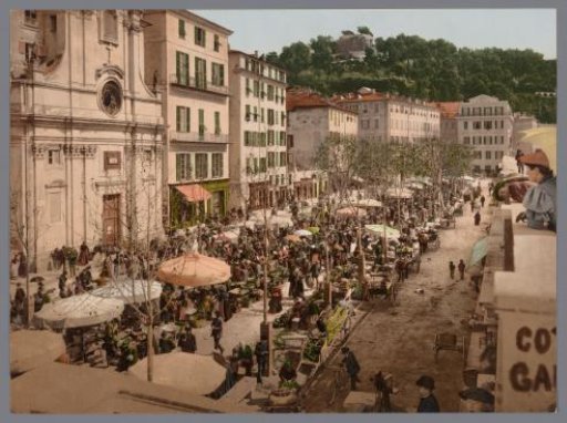View of the market in Nice, bottom right a photographer with camera