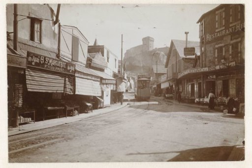 Tram through a street in Lourdes
