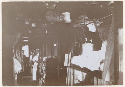 Pilgrims in a train to Lourdes