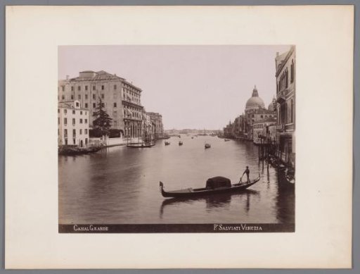 Gondolas and sailing ships on the Grand Canal in Venice
