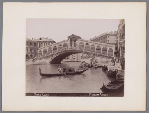 Gondolas on the Grand Canal in front of the Rialto Bridge in Venice