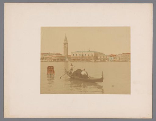 View of the Doge's Palace and the Campanile with a gondola in the foreground in Venice, Italy