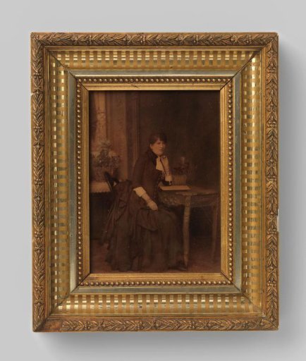Portrait of an Unknown Woman, Seated at a Table