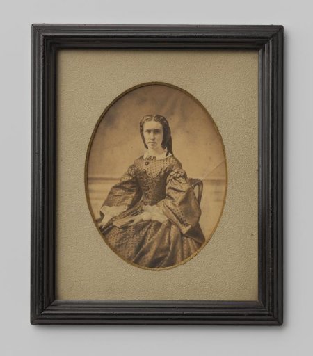 Portrait of an unknown woman holding a book