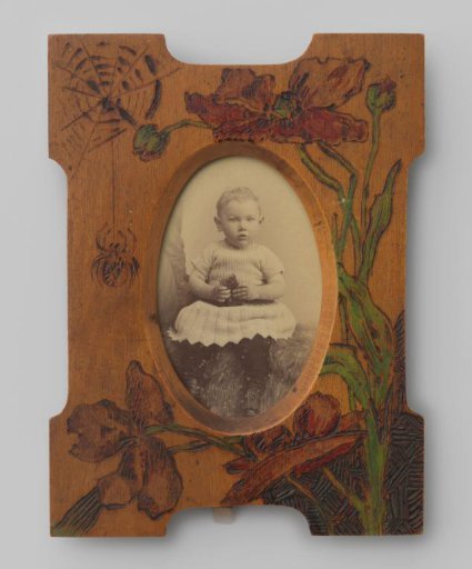 Portrait of an unknown child holding a book