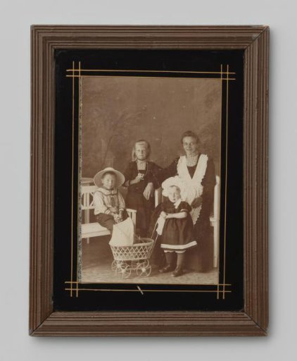 Family portrait of an unknown woman and three unknown children