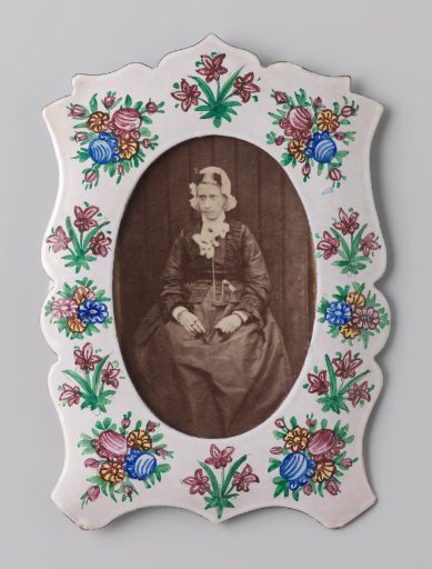 Portrait of an Unknown Woman in Traditional Dress with Ear-ornaments and Cap