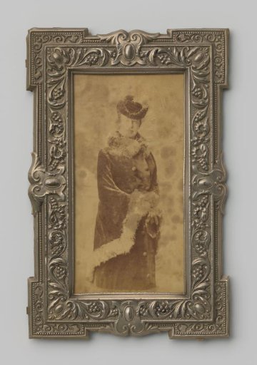 Portrait of an unknown woman in a long coat