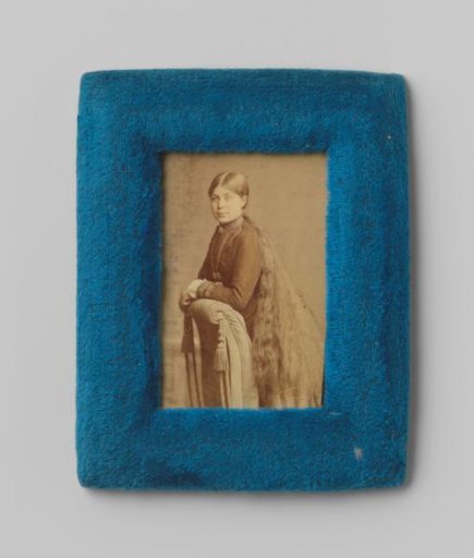 Portrait of an unknown young woman with long hair
