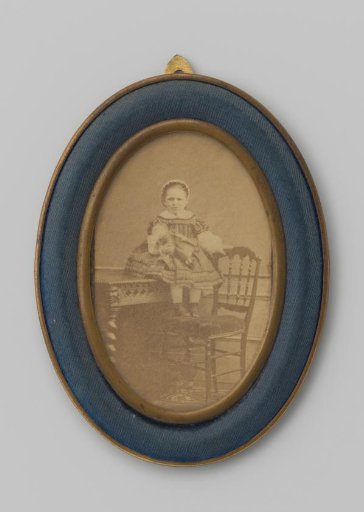 Portrait of an Unknown Girl Sitting on a Table