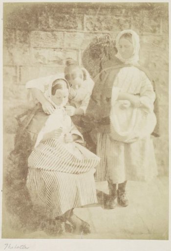 Three women reading a letter; l. to r. Marion Finlay, Margaret (Dryburgh) Lyall and Grace (Finlay) Ramsay