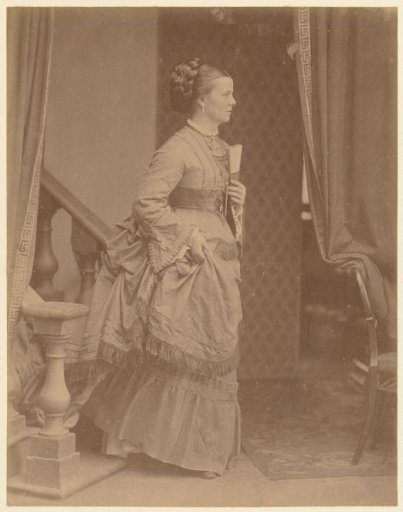 Unknown woman with a fan