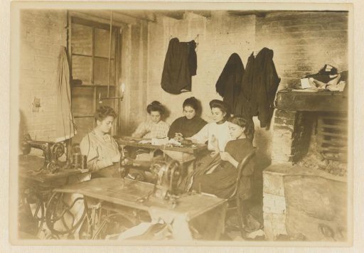 Five young seamstresses in a studio in New York