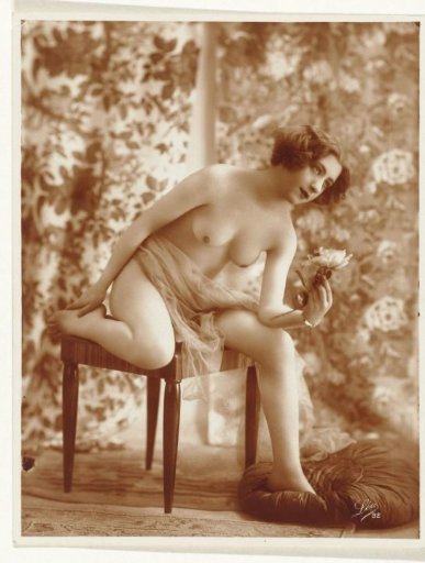 Female nude with flower