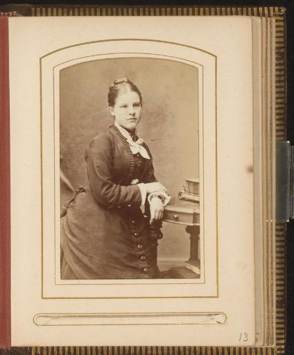 Portrait of a woman with her hands crossed, identified as Frances Emma Hunt