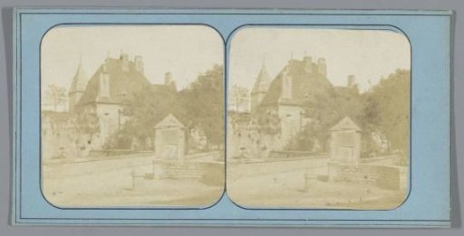 House among trees and a wall