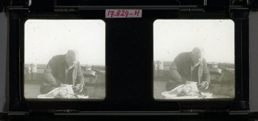 Man Working on the Deck of a Ship