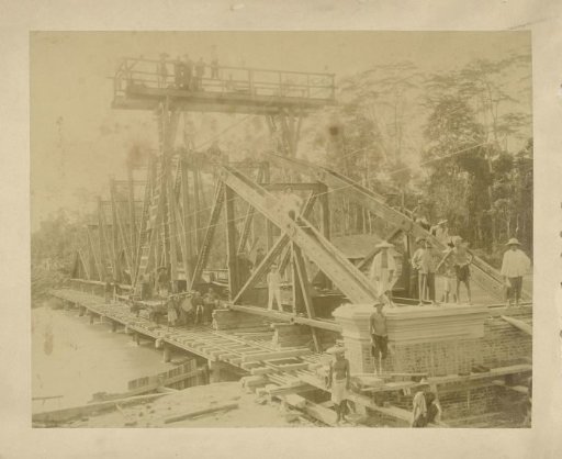 Contract workers and Europeans at a railway bridge under construction, Dutch East Indies