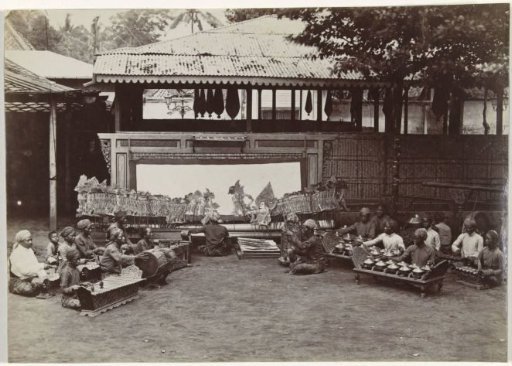 Wayang Kulit accompanied by a gamelan orchestra, Dutch East Indies