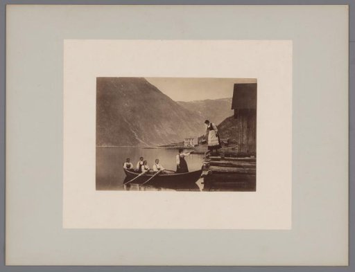 Women in a rowing boat in the Hardangerfjord, Norway