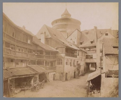 Street view in Nuremberg with tower of the city wall