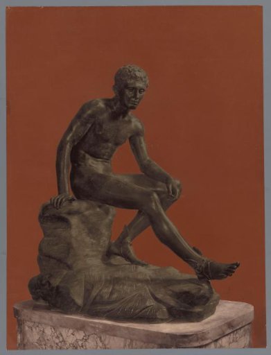 Statue of Mercury resting on a stone